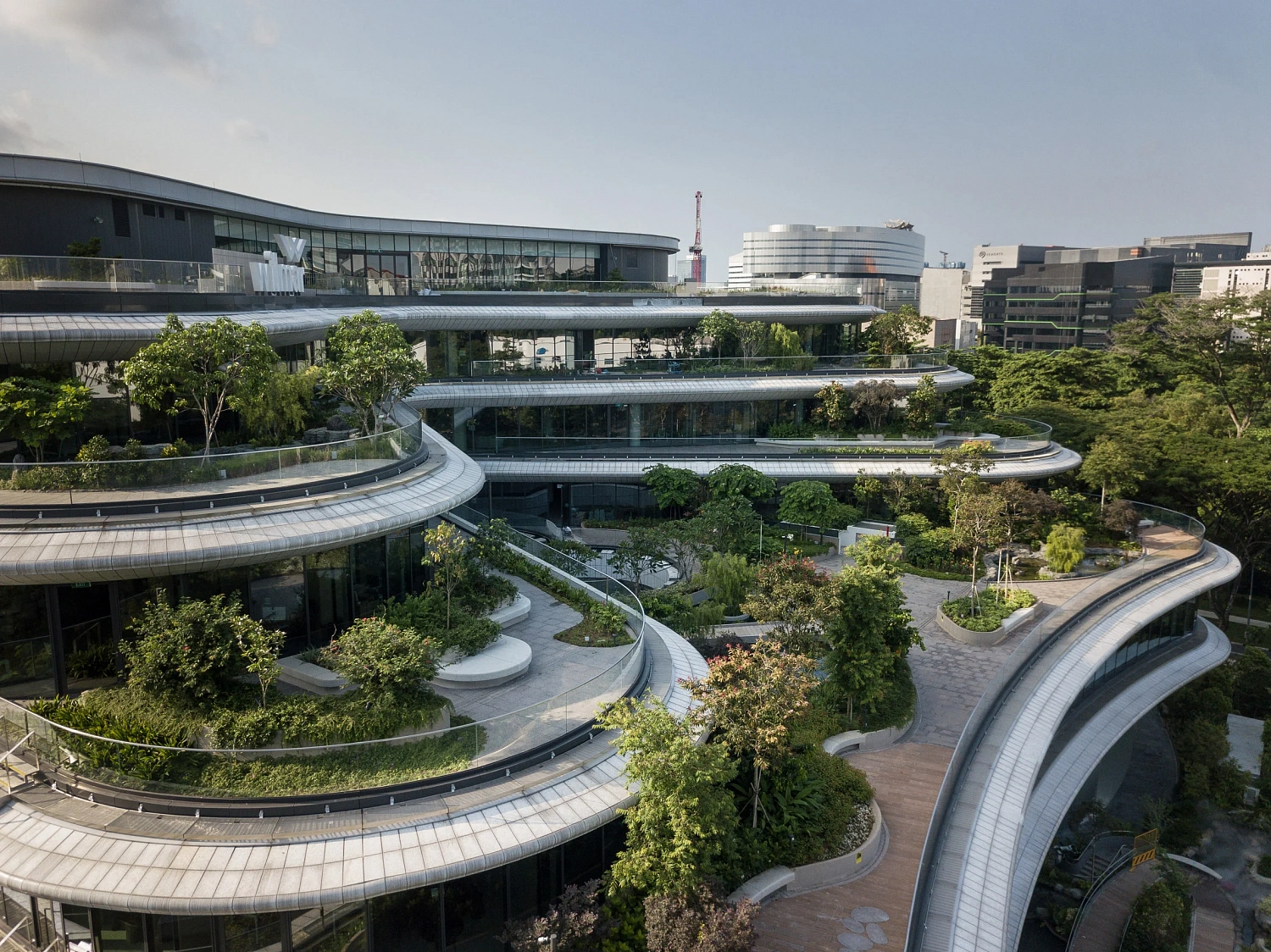 Компания Eric Parry Architects построила «каскад садовых террас» в  офисном здании в Сингапуре